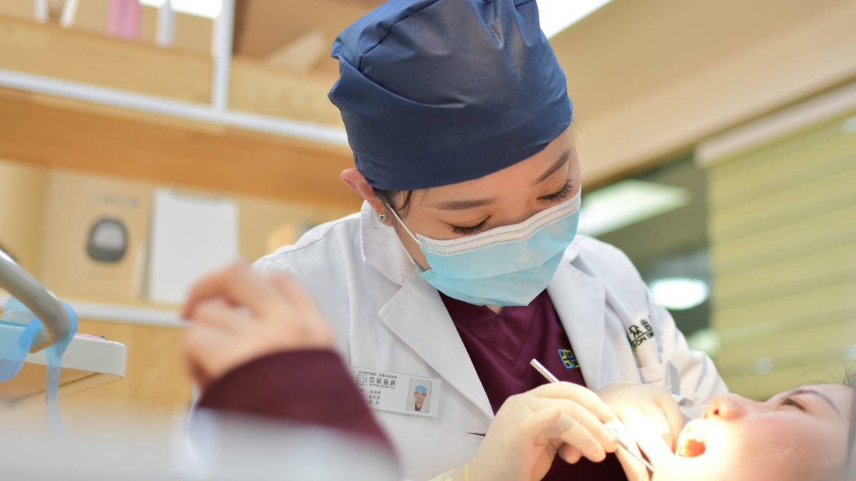 dentist working on an individual