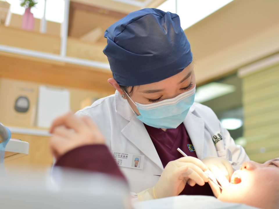 dentist working on an individual